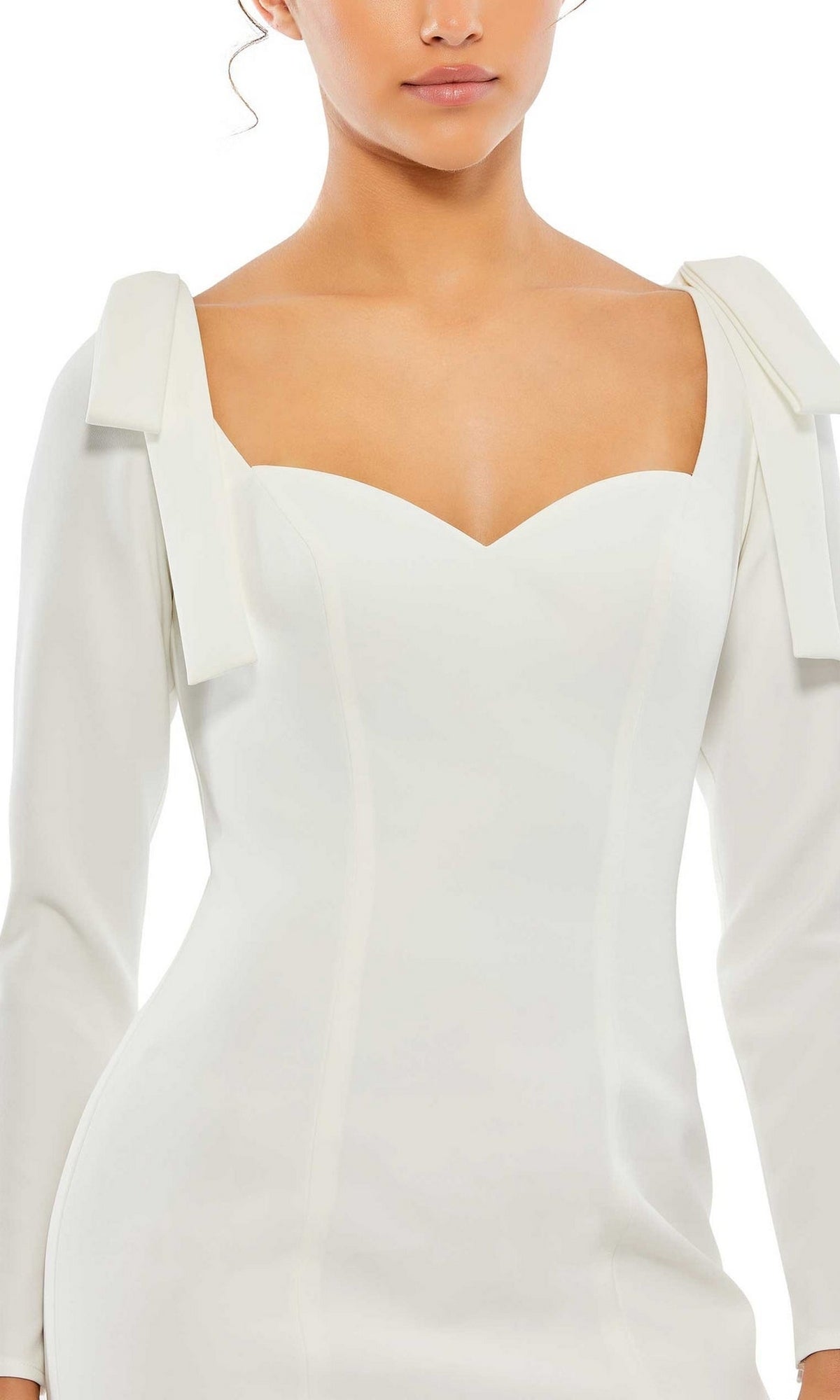 Woman wearing the Long-Sleeve Short White Semi-Formal Dress 26643, featuring a sweetheart neckline and bow details on the shoulders.